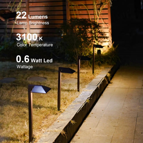 Low Voltage Landscape Path Lights 8 Pack Kit LED 22 Lumen Outdoor Walkway Pathway Lighting Wired Bronze Finish 3100K Warm White With Cable Connectors Easy Install For Your Yard illuminating garden path at night.