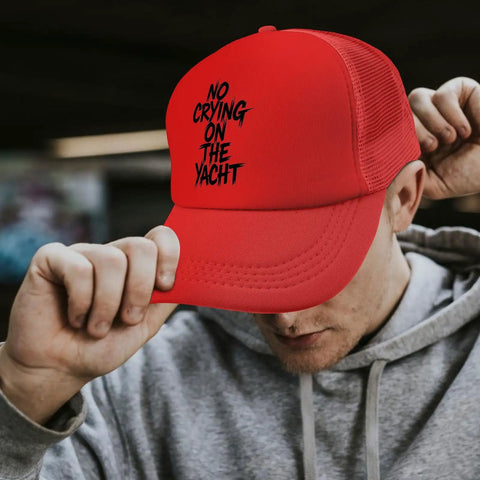 Man wearing red ponytail baseball hat for men lightweight hiking cap with anti sweat band breathable design ideal for outdoor adventure