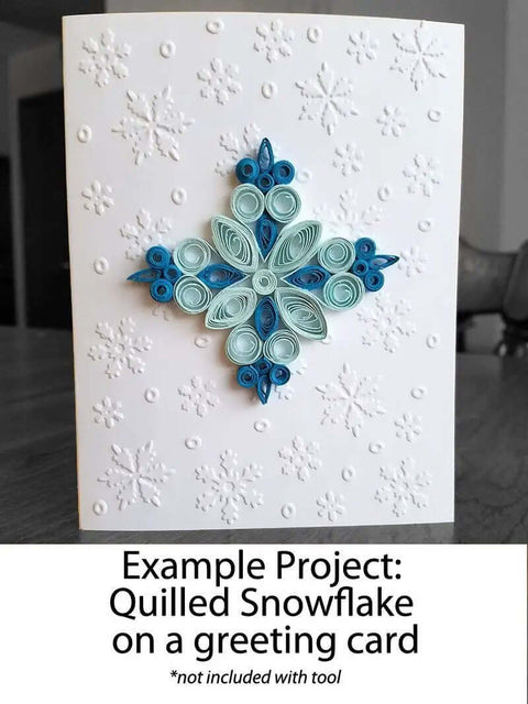 Quilled snowflake design on greeting card, showing detail and complexity achievable with Pro Grade Bead Roller Quilling Tool.