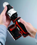 Black+Decker cordless drill with red/black body and metal chuck held by hands