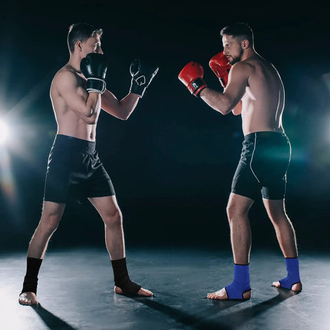 Two Pairs Muay Thai Ankle Supports Compression Sleeves For Men And Women in boxing stance, black and blue, size large