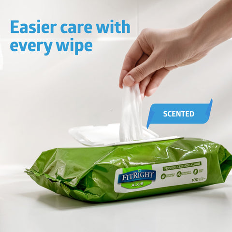 Hand pulling wipe from Aloe Based Personal Cleansing Wipes For Sensitive Skin, Scented, Large 8 By 10 Inch Incontinence Wipes.
