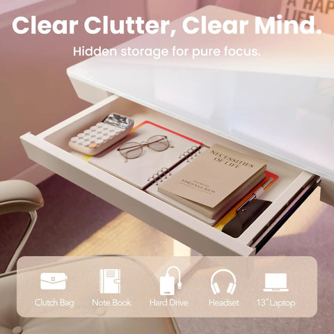 Open drawer of Glass Standing Desk With Drawers, 35 By 20 Inch Electric Adjustable Height showing hidden storage and accessories