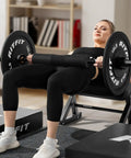 Person using Olympic Barbell 4ft 6ft 25mm Shaft For Serious Gains Heavy Duty Weightlifting Bar for hip thrust in home gym