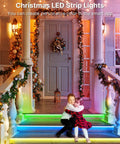 Children sitting on steps decorated with 65.6 Ft Waterproof LED Strip Lights With Remote, SMD 5050 Color Changing