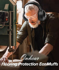 Man wearing Noise Canceling Ear Muffs For Adults And Kids, working in workshop with hearing protection gear.