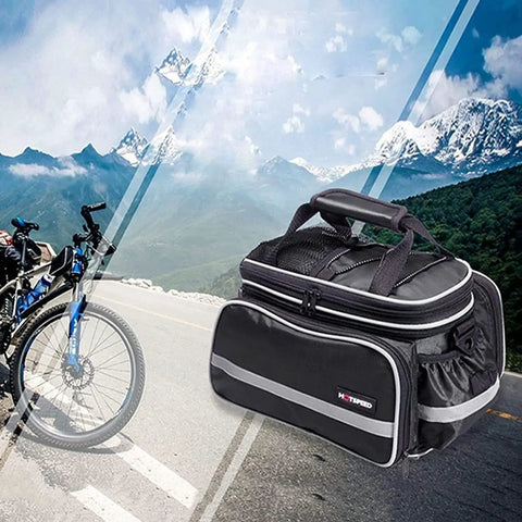 Waterproof Nurse Tote Bag And Travel First Aid Kit Rugged Multifunction Medical Organizer on mountain road with bicycle