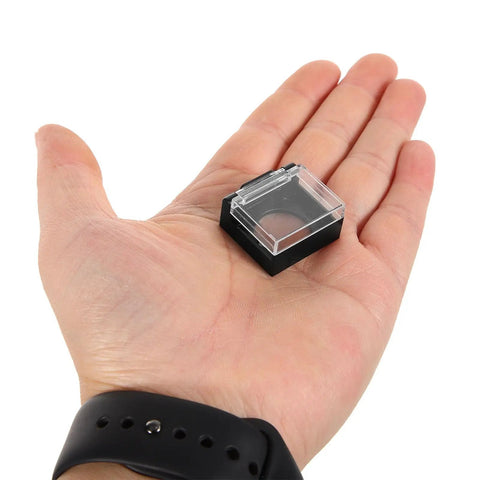 Durable 16mm Square Push Button Guard Covers Rugged Tough Dustproof Protective Caps in a hand, clear and black cover