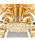 Close-up view of Eight Head K9 Crystal Ceiling Fan Light with gold accents, crystal details, and LED glowing elements.