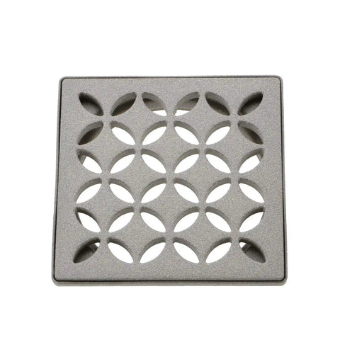 Kerdi-Drain Grate Kit With Integrated Slope Bonding Flange in stone grey floral finish, top view of 4-inch grate system.