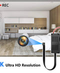 Mini Camera 1080P HD Portable With 7 Hours Battery Life, DIY Setup And Easy Use, Motion Detection Alerts, No Audio, Compact Spy Camera For Home Or Office, Multi User Access, Fast Setup And Discreet Monitoring in a modern bedroom.