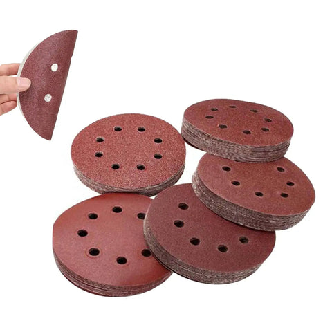 5 Inch sandpaper discs showing aluminum oxide material for polishing and paint removal. Check Out This Rad 5 Inch Sandpaper Set Of 75 Aluminum Oxide Discs With Five Grits Made Super Tough For Chipping Rust, Peeling Paint, And Polishing Wood Or Metal Gear Up Your Garage Projects Today.
