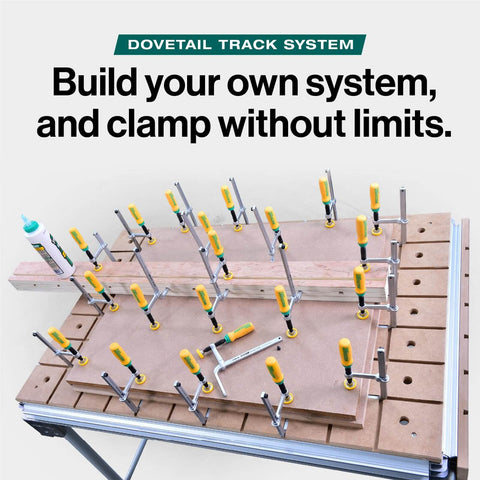 MatchFit Dovetail Clamps for Woodworking Track System Tools 2 Pack Yellow Green in use on workbench with routed grooves.