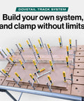 MatchFit Dovetail Clamps For Woodworking Track System in use on wooden workbench with multiple clamps securing wood pieces.