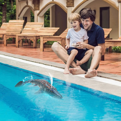 Father and child playing with Remote Control Mosasaurus Vs Shark Dino Toy with light and water spray by the poolside