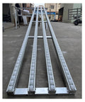 Light Duty Stainless Steel Frame Roller Conveyor With Unpowered Plastic Rollers For Bottled Water, Cartons And Beverages Gravity Fed System For Easy Loading, Smooth Material Handling, Built To Last. stainless conveyor, 4 lanes, front view