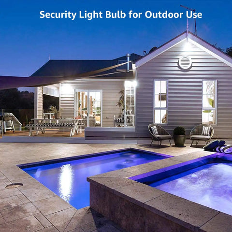 House exterior with lit pathway using Outdoor Dusk To Dawn LED Bulbs Two Pack With Auto On Off Sensor 9W 806 Lumens.