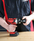 Person using Dodge Axle Nut Socket One And Eleven Sixteenths Inch One Half Inch Drive Chrome Moly with power drill