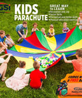 Children playing with a 12-foot rainbow parachute in a field, showcasing the Rainbow Parachute Play For Kids 12 Foot Playground Parachute For Cooperative Games Outdoor Gym Class And Indoor Play Durable Polyester Construction With CrossStitched Handles For Easy Group Fun.