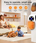 Compact 450W Mini Space Heater With Temperature Detection Remote Control Wall Outlet in living room with child and dog.