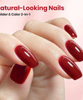 Close-up of manicured hand with glossy red nails using 8 In 1 Builder Gel Nail Kit For Strengthening And Extensions HEMA And TPO Free Crystal Rose Red With Nail Art Brush Beginner Friendly DIY At Home Salon Dope Quality UV LED Lamp Not Included