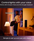 Couple in room using Smart Home Starter Kit With Bridge Pro And Four A19 And E26 Smart Bulbs, White To Color Ambiance, Alexa enabled.