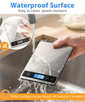 Digital Food Scale For Kitchen Gamechanger, 33 Lb Capacity, 1 G Precision, shown with water on stainless steel surface
