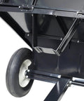 Beefy 750 Lbs Capacity Heavy Duty Steel Dump Trailer Cart With 22 Cubic Feet Hauling Space close-up of wheel and side frame