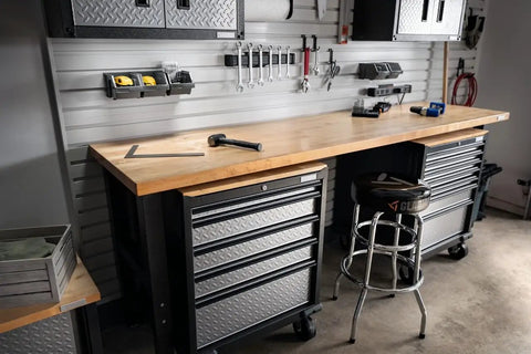 Heavy Duty Chrome Garage Work Stool With Double Ring Leg Construction, 300 Lb Capacity, next to workshop toolbench