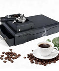 Beat The Daily Grind Electric Coffee Grounds Cleaner And Knock Box Stand Heavy Duty 58Mm Portafilter Filter Holder Washer with espresso machine, coffee beans, and cup.