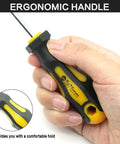 Close-up of a hand holding a screwdriver from the 43 Piece Magnetic Screwdriver Set With Sturdy Carry Case And 25 Bit Kit With Replaceable Bits.
