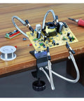 Four Arm Third Hand Soldering Station With Flexible Gooseneck Arms And Removable Tip Clamps holding PCB on workbench