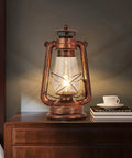 Industrial Rustic Lantern Table Lamp With Old Fashioned Oil Lamp Vibe For Farmhouse Bedroom Nightstand, warm glow on wood surface