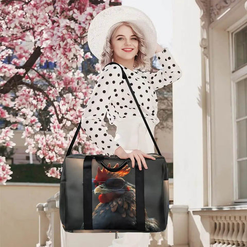 Woman holding Waterproof Weekender Carry On Duffel For Women Durable Gym Bag And Overnight Travel Tote Lightweight Tear Resistant Polyester Black Rooster Design.