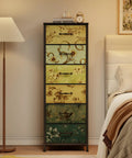 Bedroom with Tall 6-Drawer Dresser With Vintage Style Fabric Bins, Sturdy Metal Frame And Wood Top next to a bed and lamp.