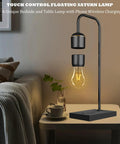 Lit Magnetic Levitating Light Bulb Lamp With Black Base on a table, glowing LED, modern home decor beside sofa plant