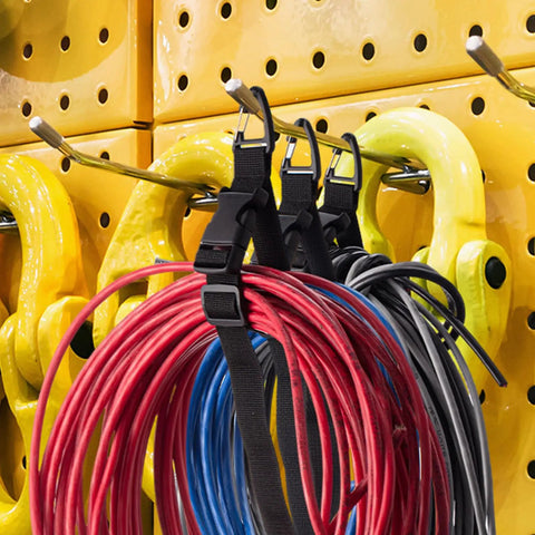 Six Pack 17 Inch Adjustable Extension Cord Holder Organizer With Triangle Clips for garage organization, holding red and blue cords.