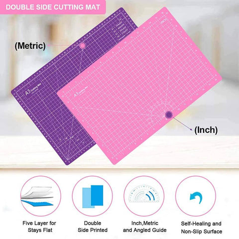 Front view of pink and purple double-sided A3 cutting mats; self-healing with metric and inch grid.