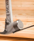 Close-up of AL-PRO Forged Aircraft Aluminum Framing Hammer 14 Oz Straight Rip Claw with Milled Face on a wooden surface.
