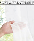 Hand holding Two Panel Sheer Voile French Door Curtains With Light Filtering, showcasing softness and breathability.
