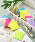 Lined Sticky Notes 3x3 Inches, 16 Pack With 56 Sheets Per Pad, Super Sticky Adhesive, 8 Bright Colors displayed on desk