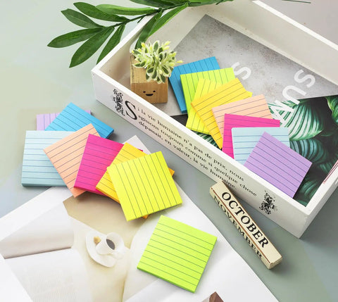 Lined Sticky Notes 3x3 Inches, 16 Pack With 56 Sheets Per Pad, Super Sticky Adhesive, 8 Bright Colors displayed on desk