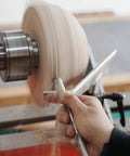 BMWOOD 1-inch stem-glide bowl-turner 4-piece toolrest set for wood lathe; front view with spinning bowl