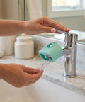 Toddler Faucet Extender 4 Pack Splash Free Sink Water Guide attached to a tap, enables easy handwashing for kids.