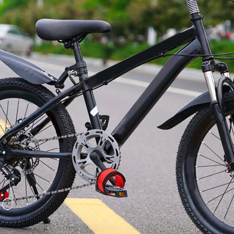 One Pair Adjustable Bike Pedal Straps For Extra Grip And Comfort Anti Slip Nylon Foot Clips With Double Adhesive Straps shown on bike