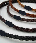 Four braided cables with black strain reliefs, featuring 50 Pairs Plastic Pendant Lighting Strain Reliefs for Lamps and Fixtures M10 Cable Glands Cord Grips for Wiring Ceiling Light Replacement Heavy Duty Black.