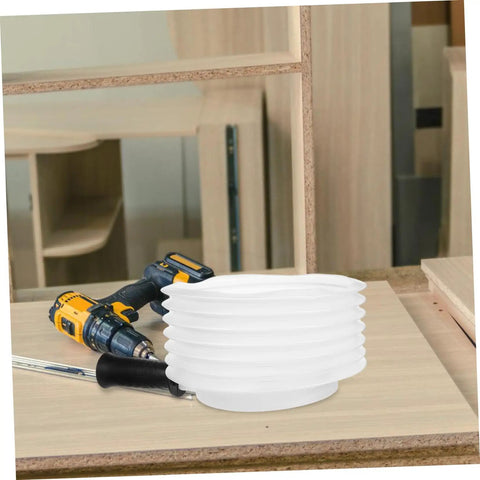 Transparent Drill Dust Collector Cover For Electric Drills And Grinders With Rock Solid Debris Shield sits on a worktable with tools.