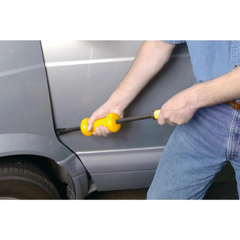 Person using Dent And Seal Puller Set 9 Piece With Slide Hammer And Attachments For Auto Body Repairs on car panel