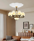 Heavy Duty White Metal Electric Hoist Lift System For Hanging Chandeliers With Cool 2-in-1 Switch, Durable 330 Lbs Load Capacity hanging chandelier in modern living room setting.