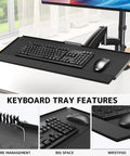 Premium Ergonomic Sit Stand Monitor Desk Mount With Wide Keyboard Tray For 17 To 32 Inch Screens, showcasing large keyboard tray and mouse.